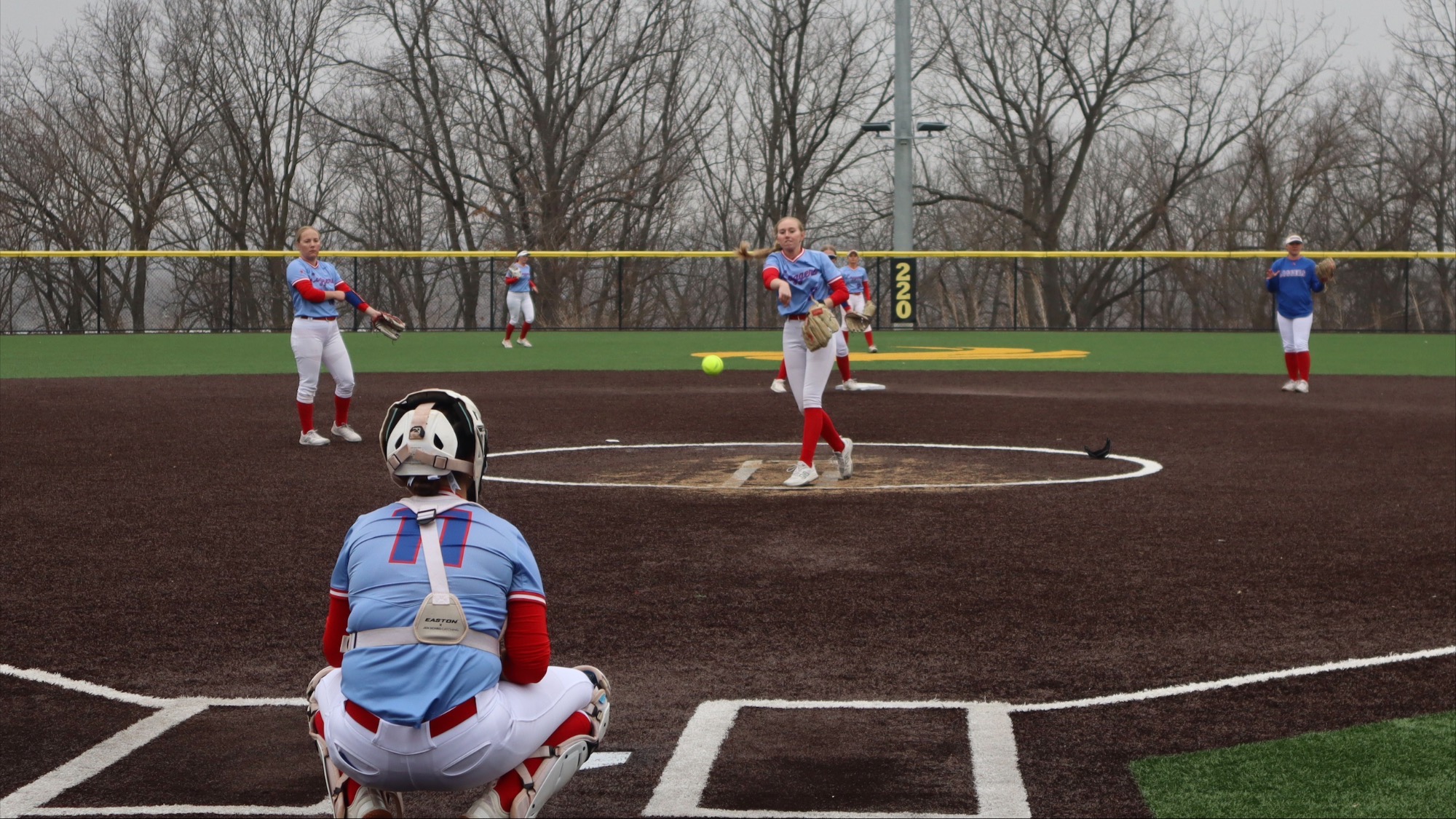 LLCC softball players playing softball.