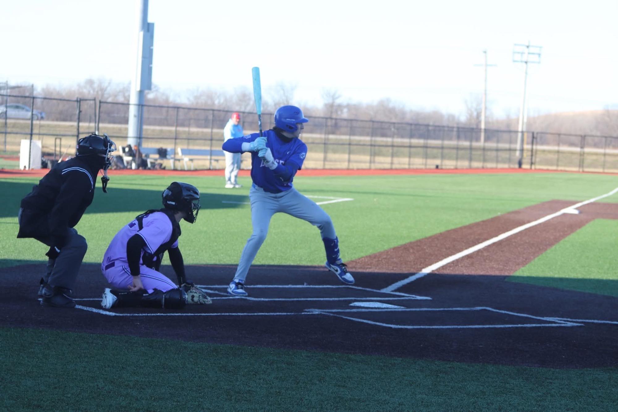 LLCC baseball player hitting.