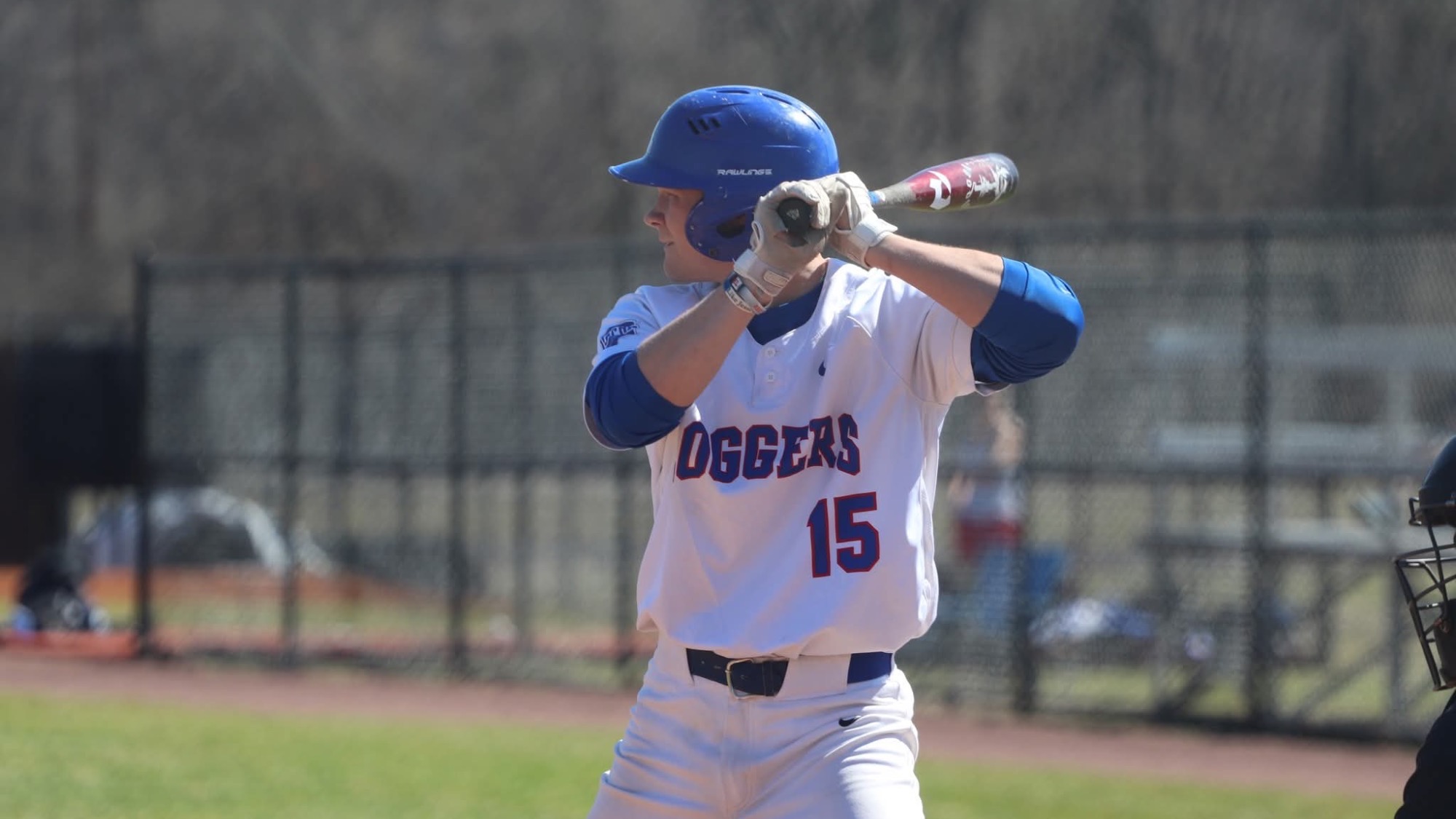 LLCC baseball player hitting a ball.
