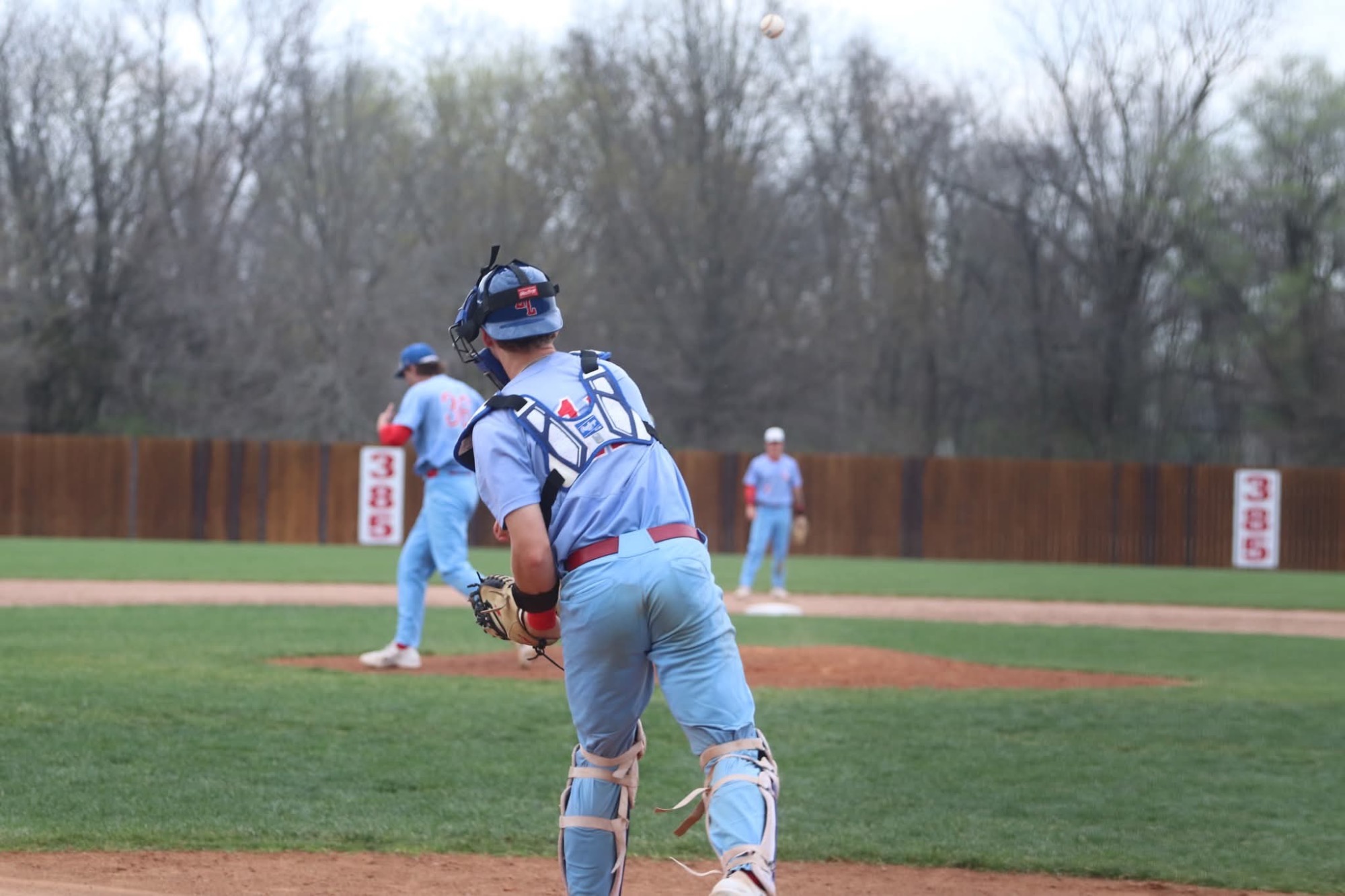 LLCC catcher throwing the ball down to second base.