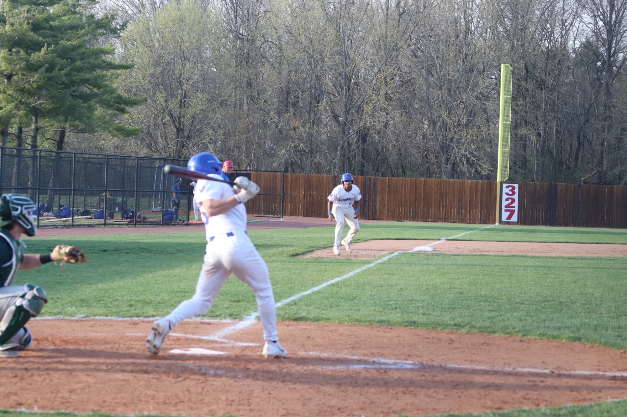 LLCC baseball player hitting a ball.