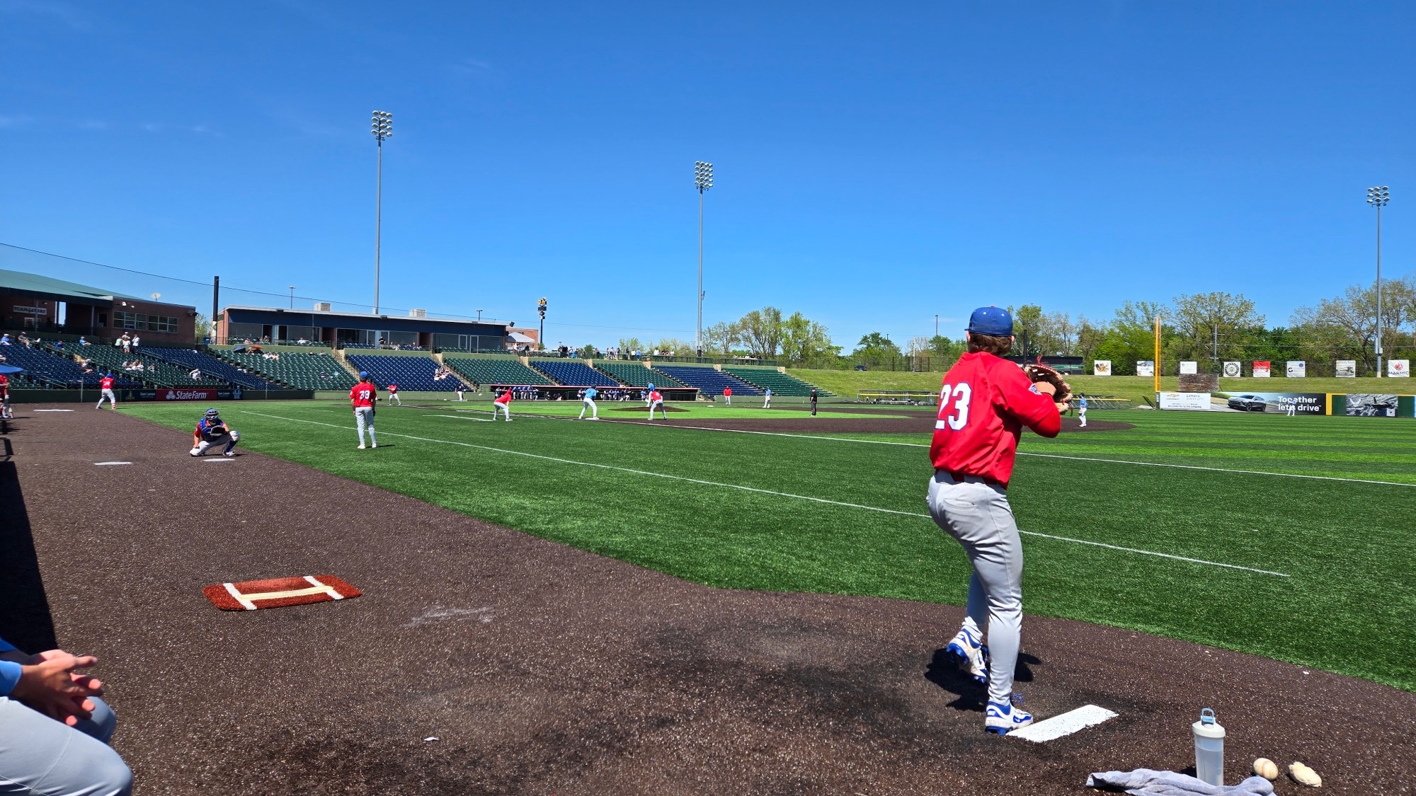 LLCC pitcher throwing a baseball.