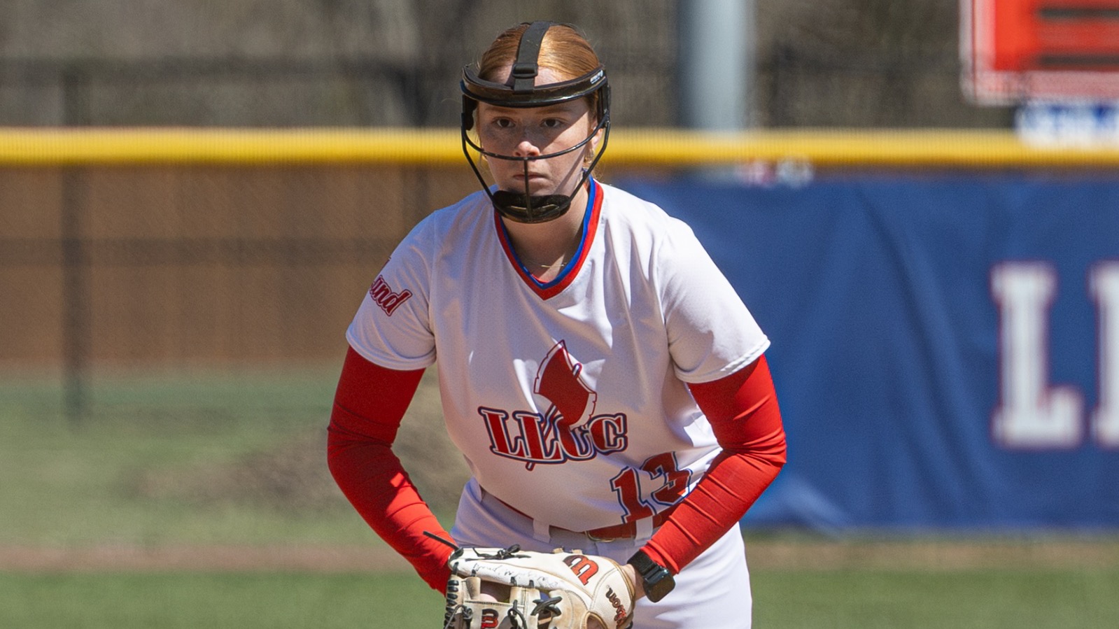 LLCC softball pitcher pitching.