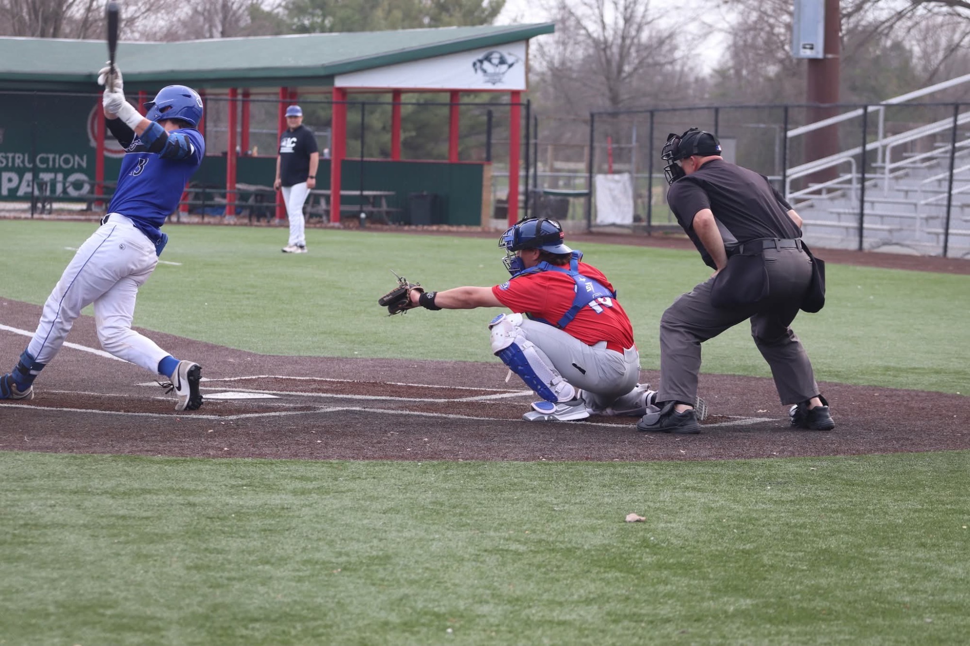 LLCC baseball player catching a ball.
