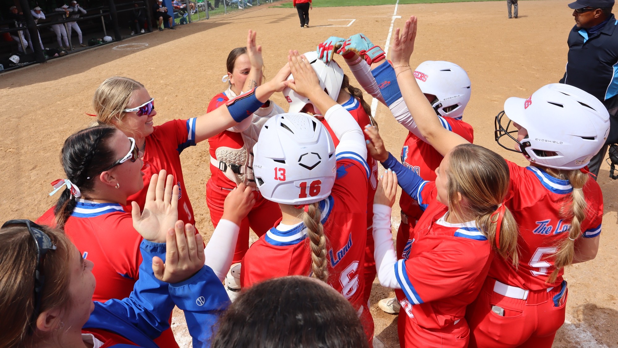 LLCC softball team cheering.