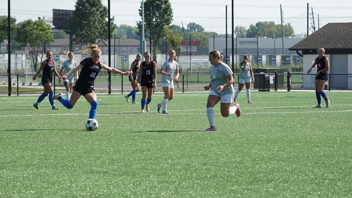 LLCC women's soccer team playing soccer.