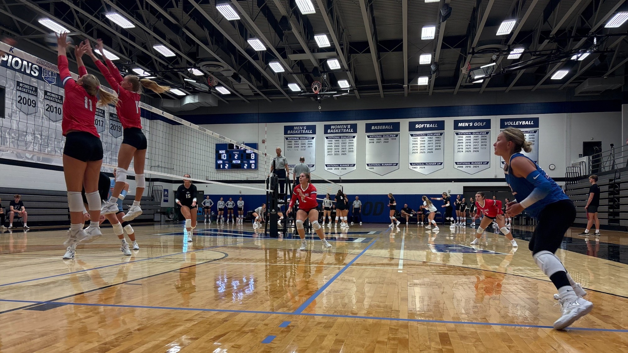 LLCC volleyball team playing volleyball.