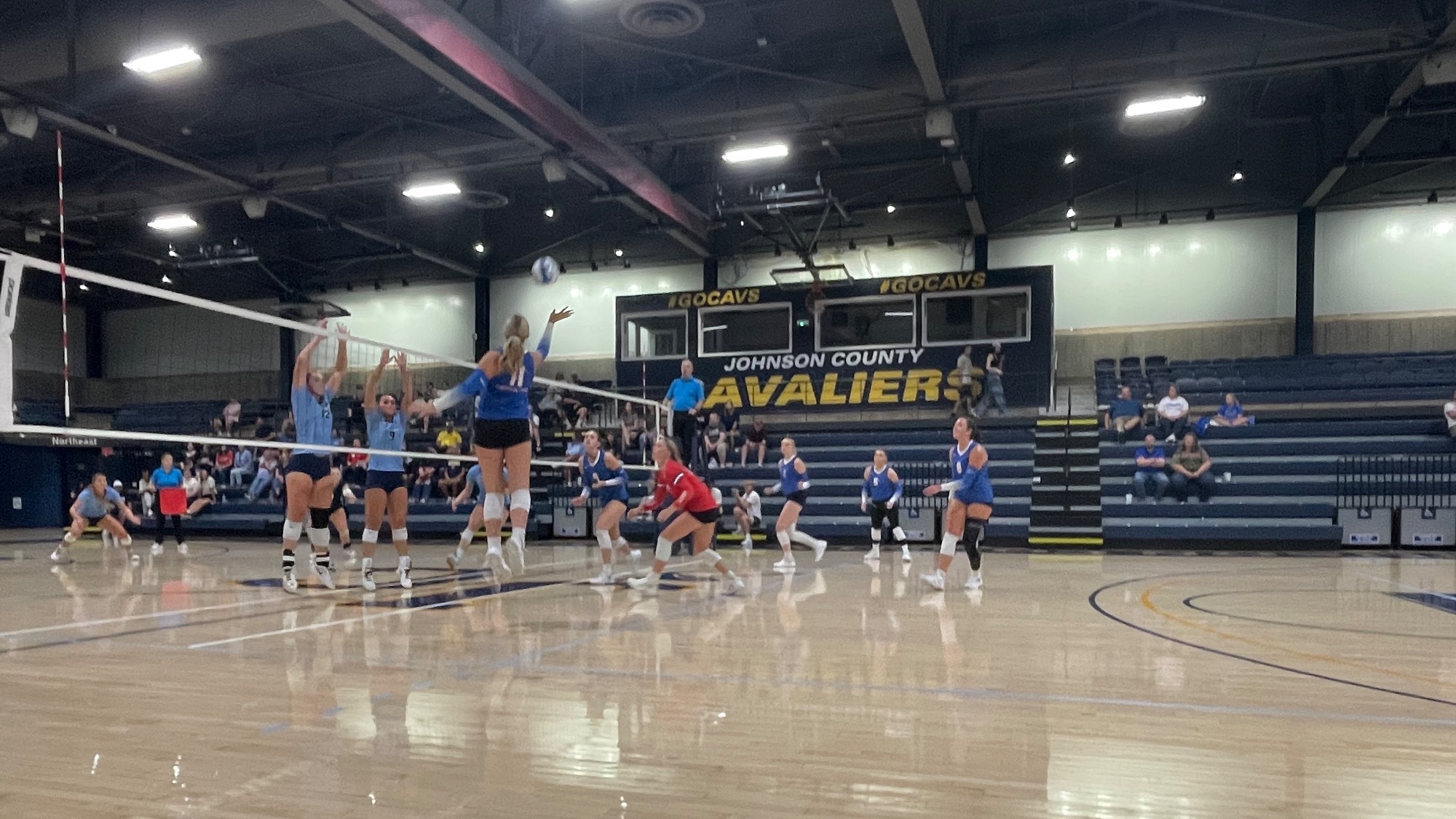LLCC volleyball playing volleyball.