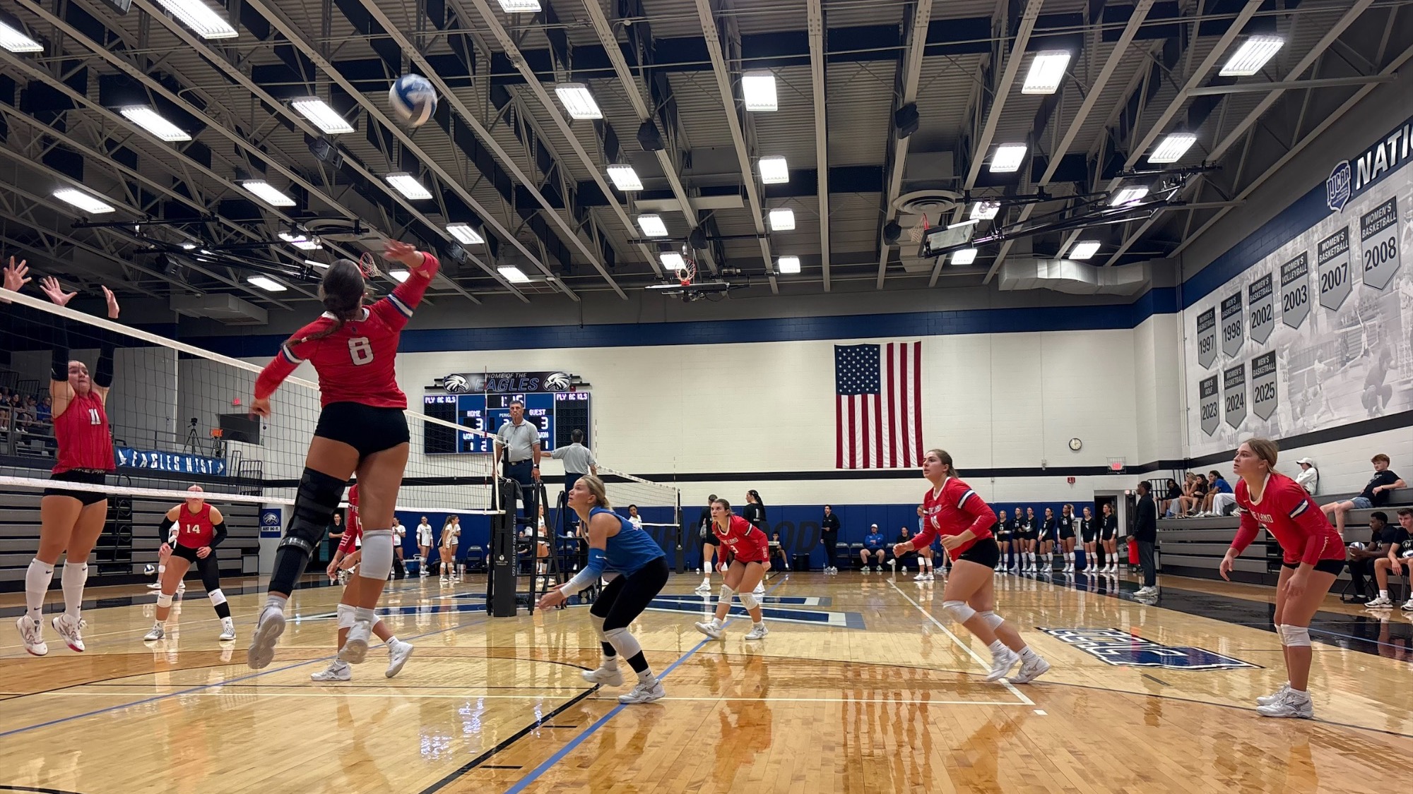 LLCC volleyball team playing volleyball.