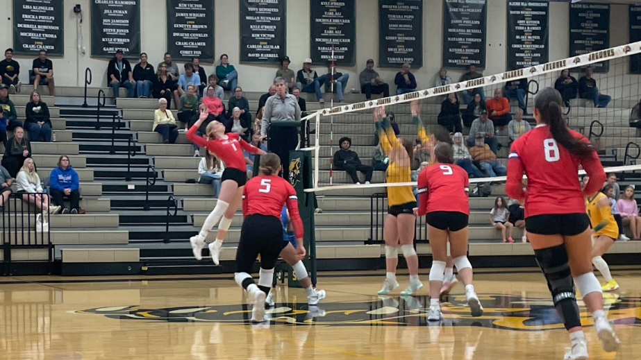 LLCC volleyball team playing volleyball.