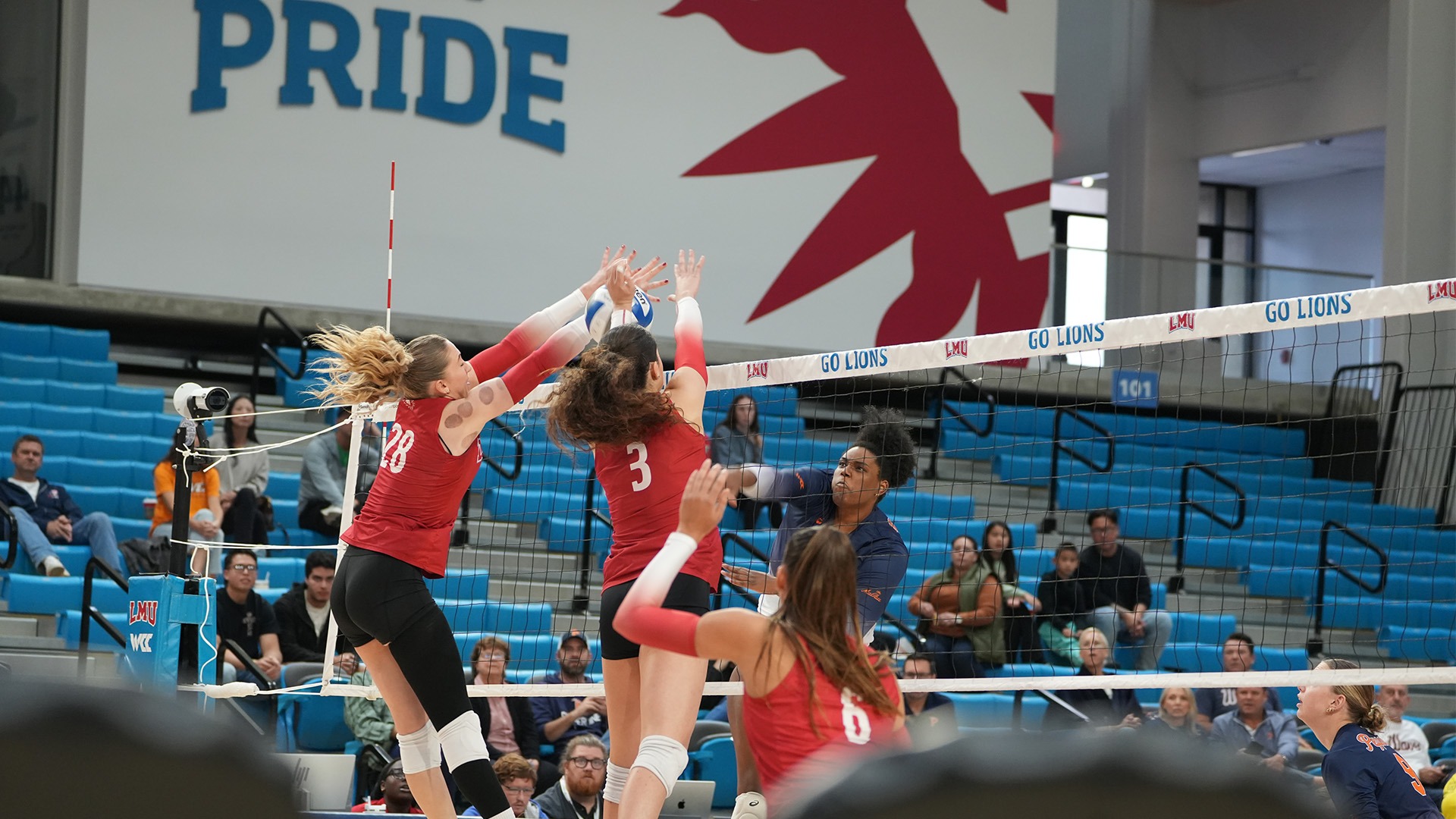 players block volleyball