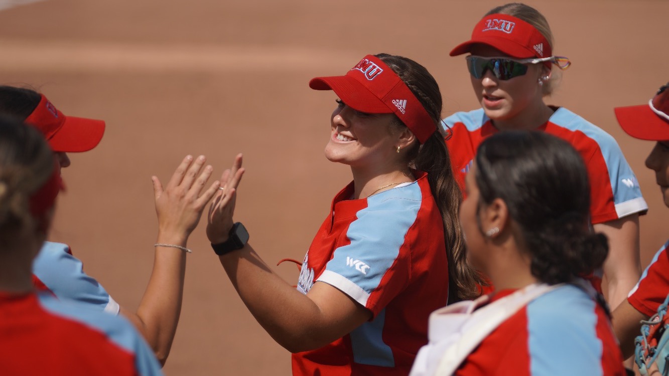 Lindsay Smiling Giving High Five
