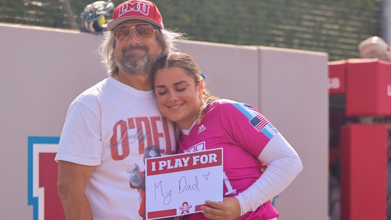 Lindsay and her father - strikeout cancer game