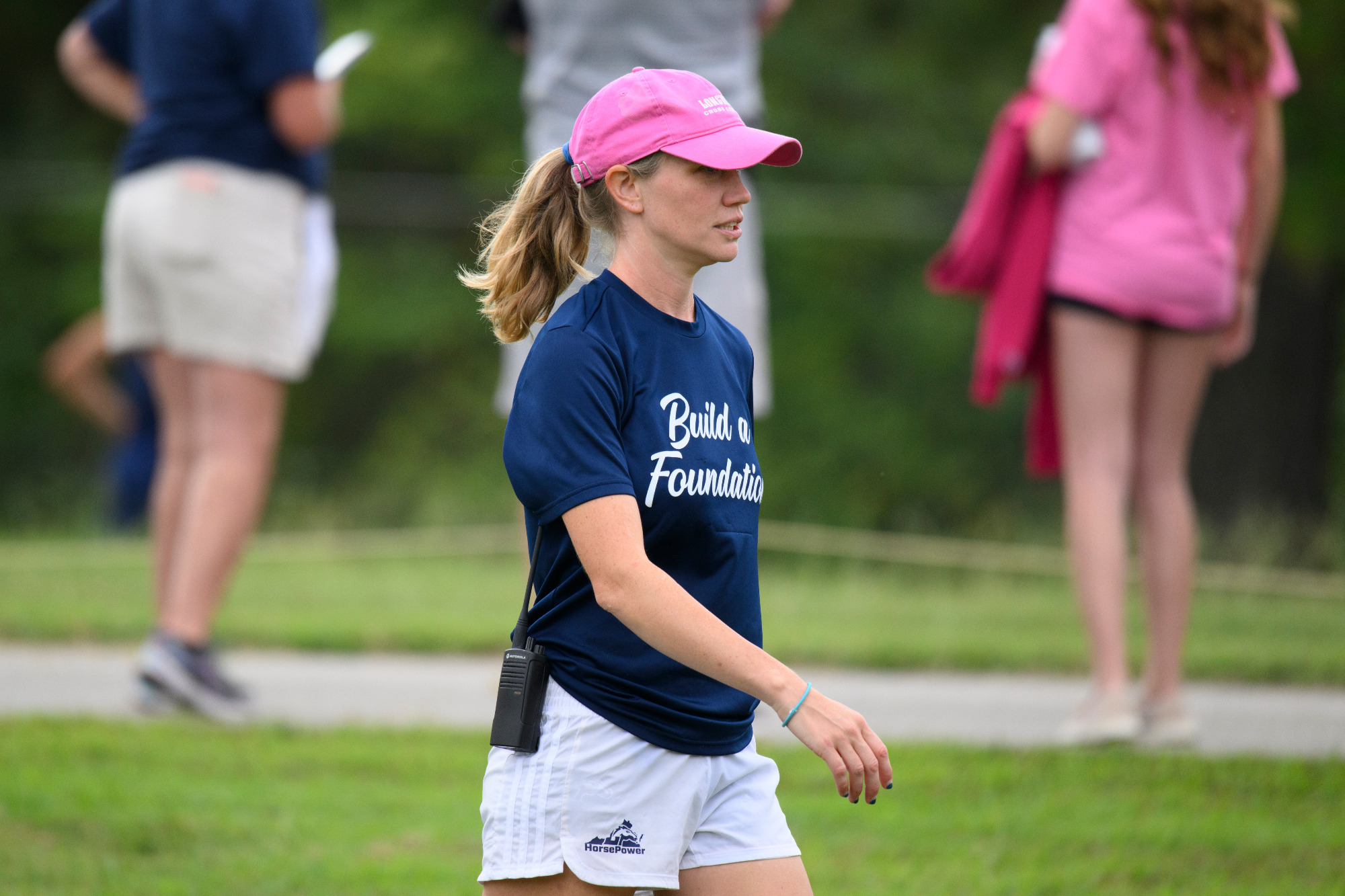 Brooke Craig walks at the Lancer Pink Invitational