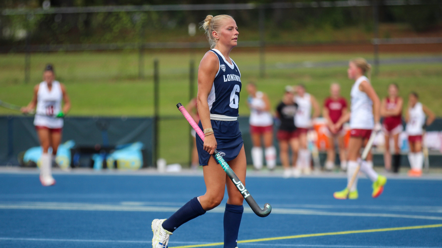 Channy Johnson walks up the field