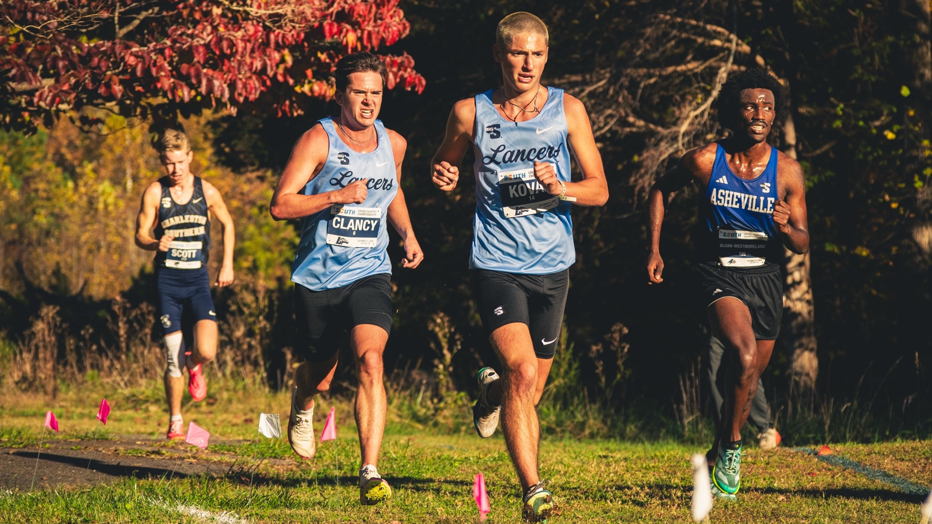 Clinton Clancy (left) and AJ Koval (right) run at the Big South Championship