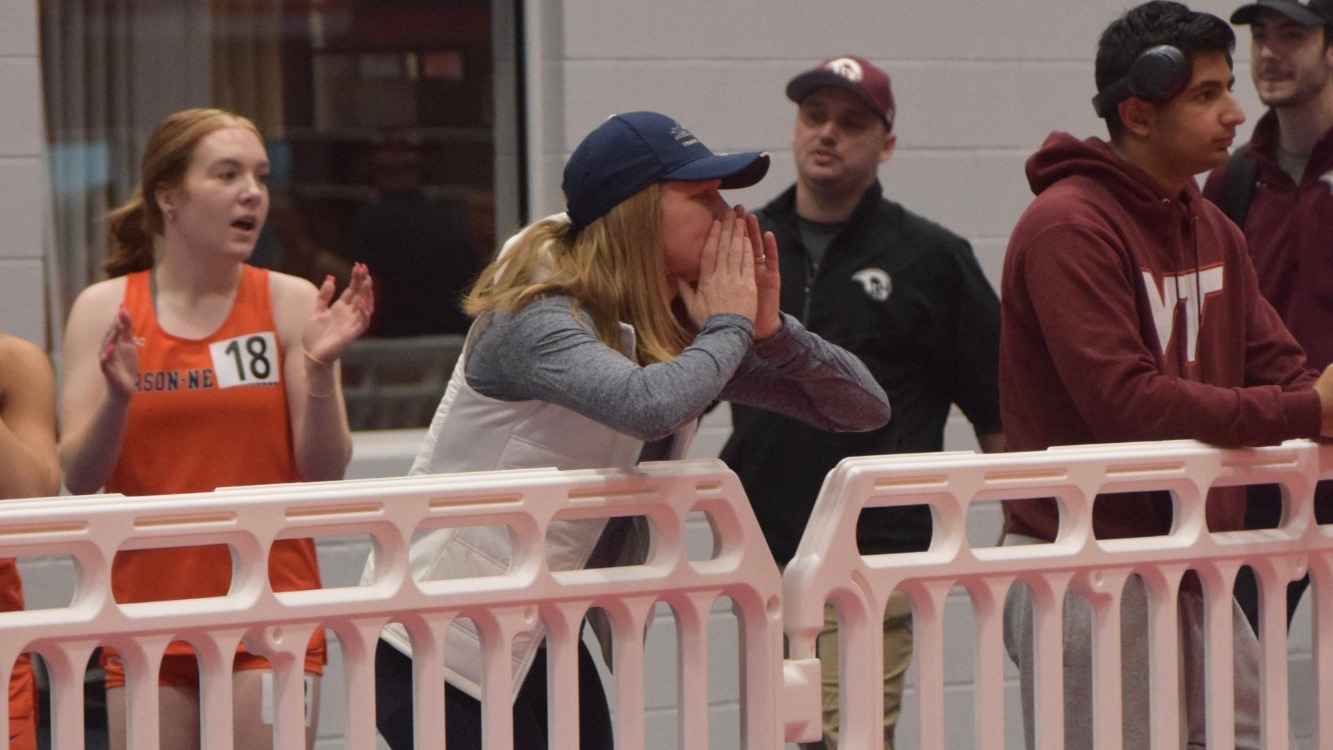 Head Coach Brooke Craig leading outdoor track last season