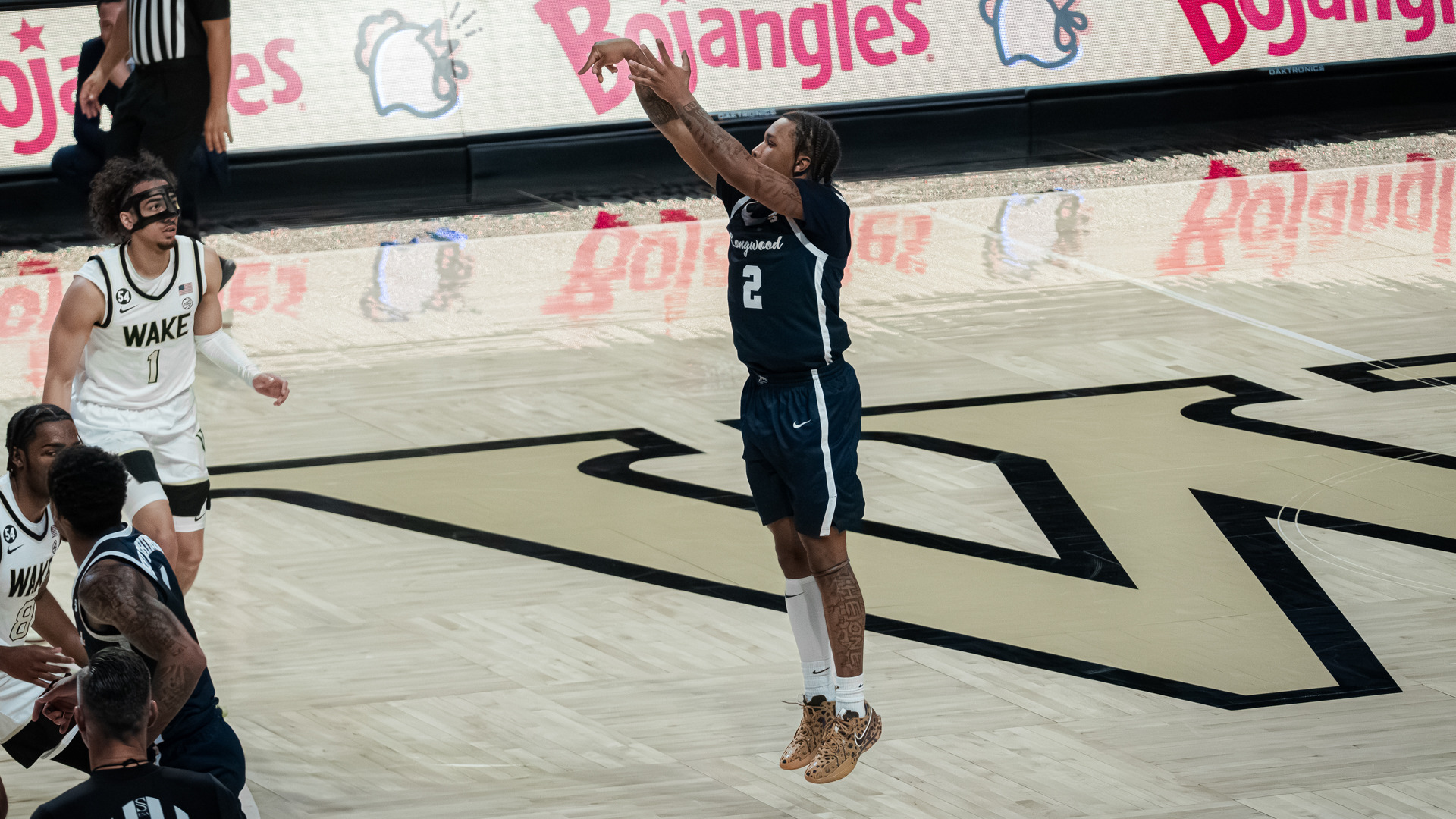 Redd Thompson Jr. shoots a three against Wake Forest