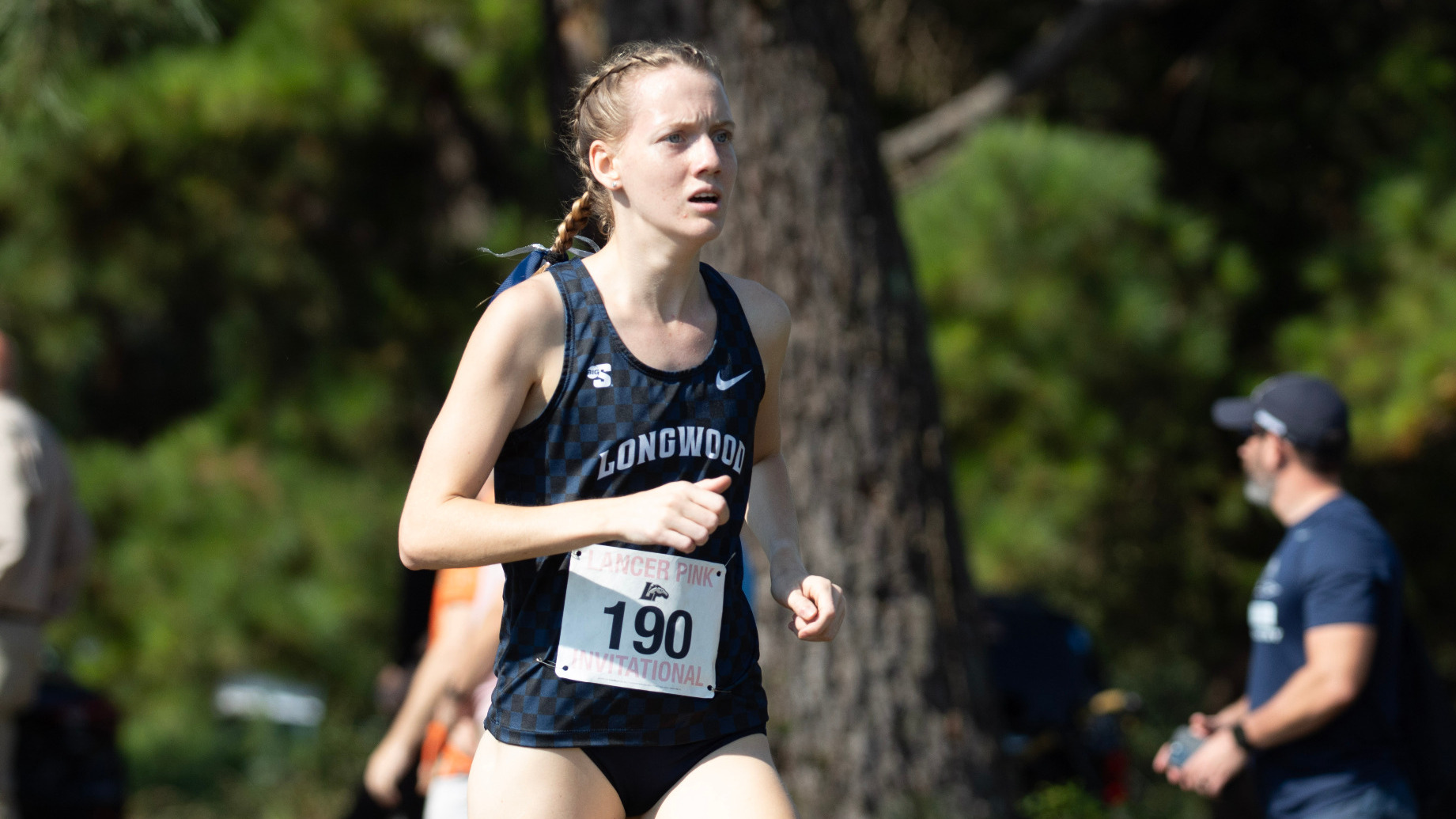 Sophie Farley runs at the Lancer Pink Invitational