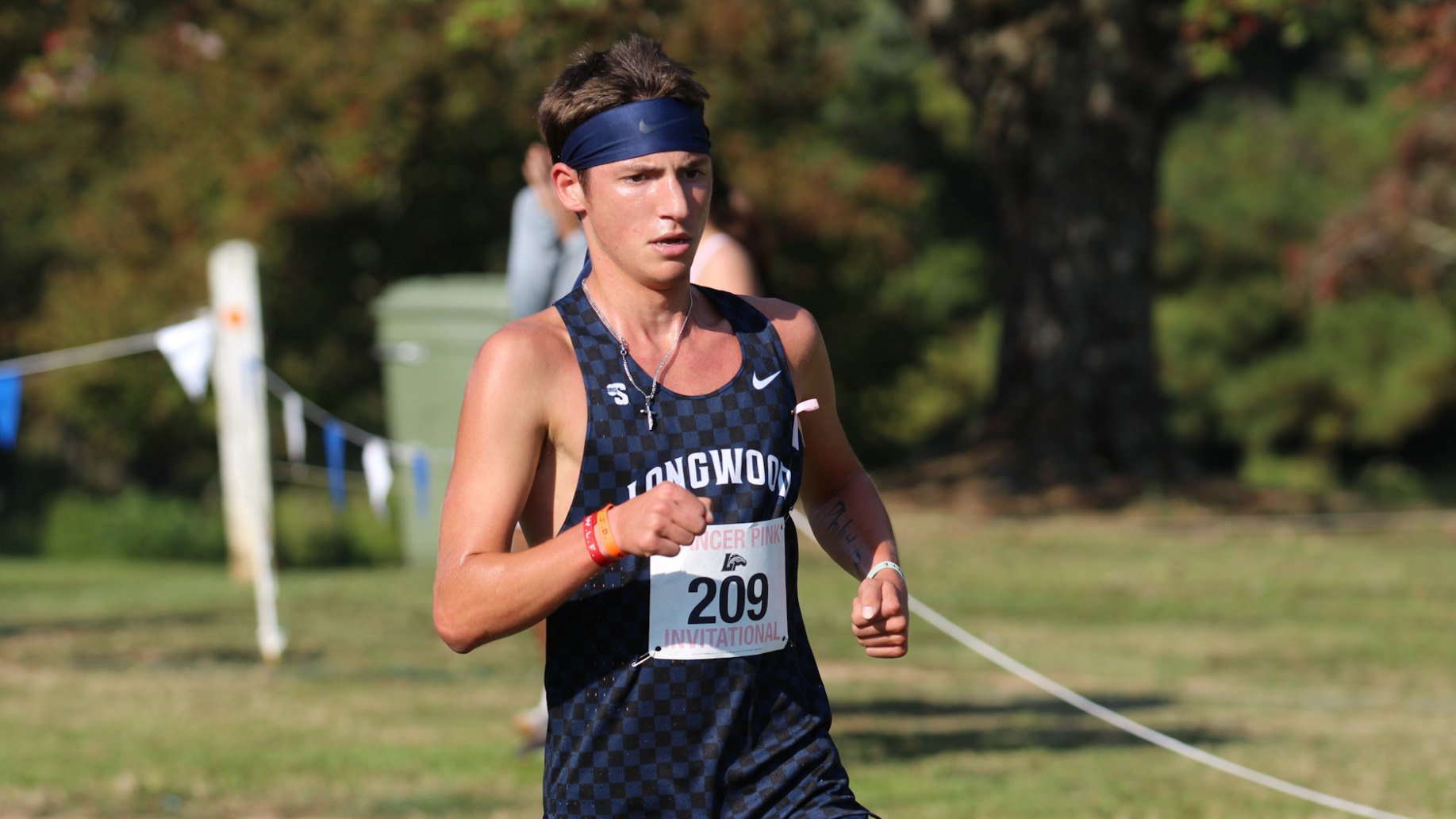 AJ Koval runs at the Lancer Pink Invitational