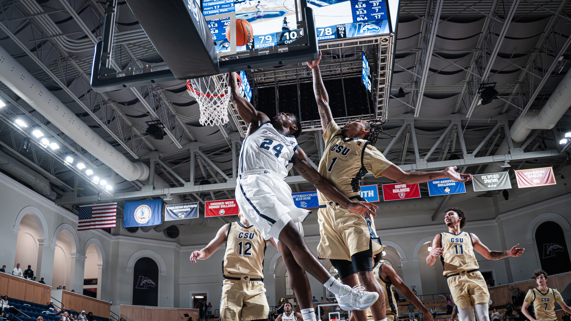 Jaylen Benard shoots a layup against Charleston Southern in overtime