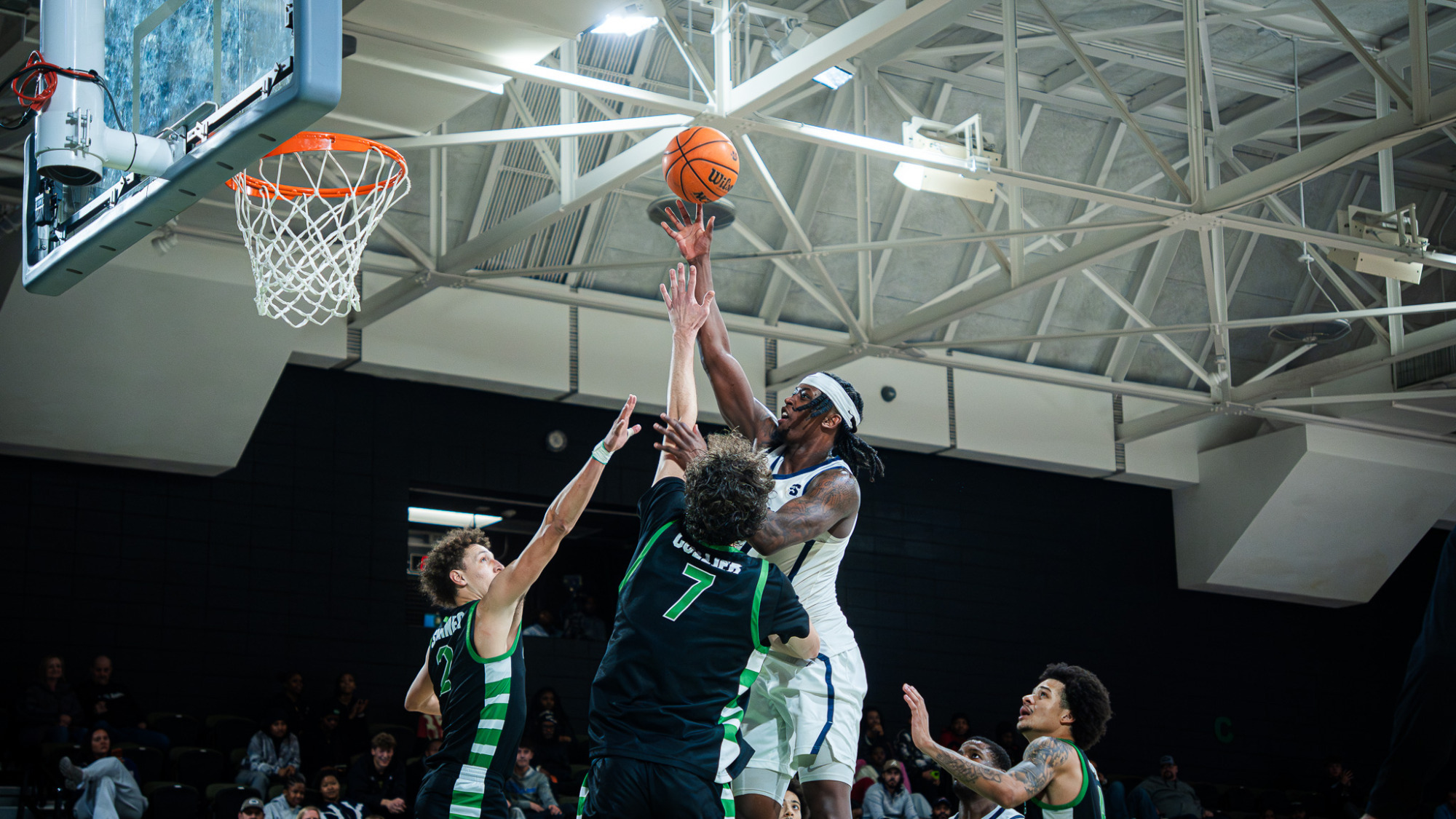 Elijah Tucker shoots a jump hook