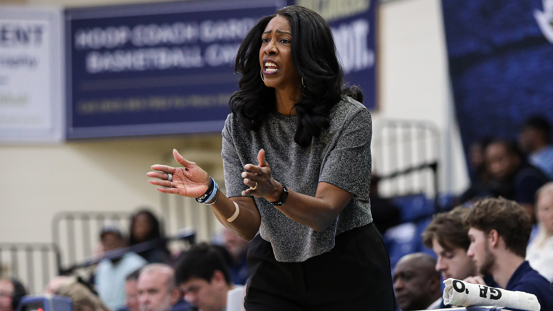 Erika Lang-Montgomery coaches her team from the sideline during a game at Charleston Southern on January 7, 2026