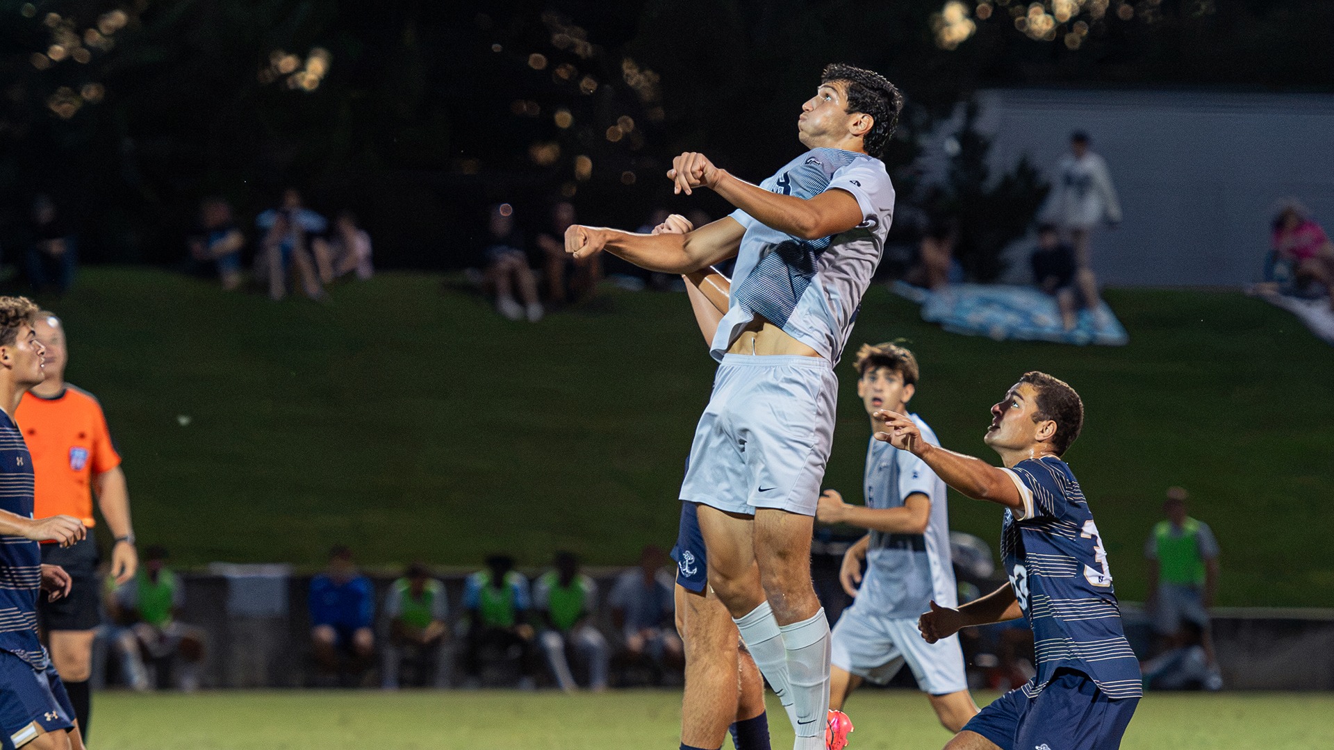 Levon Saribekyan elevates for a header in Longwood's home game against Navy. 