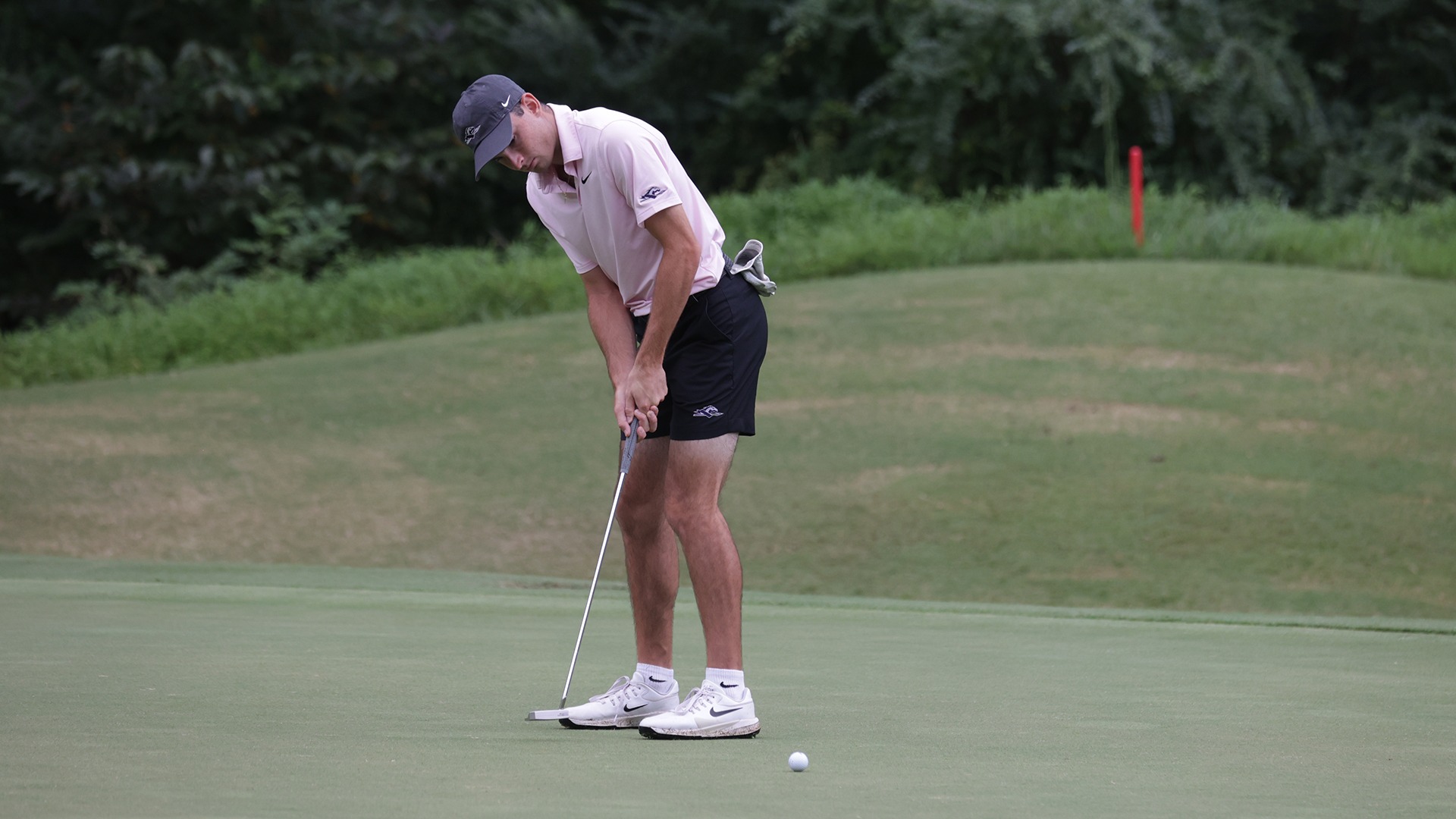 Matthew Lyons rolls in a putt at the season-opening Bryan National Collegiate at Bryan Park in Browns Summit, N.C.