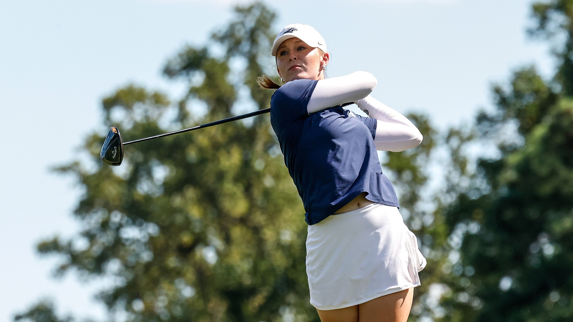 Abbie Moore follows through after hitting a driver off a tee during the practice round at the Tribe Invitational.
