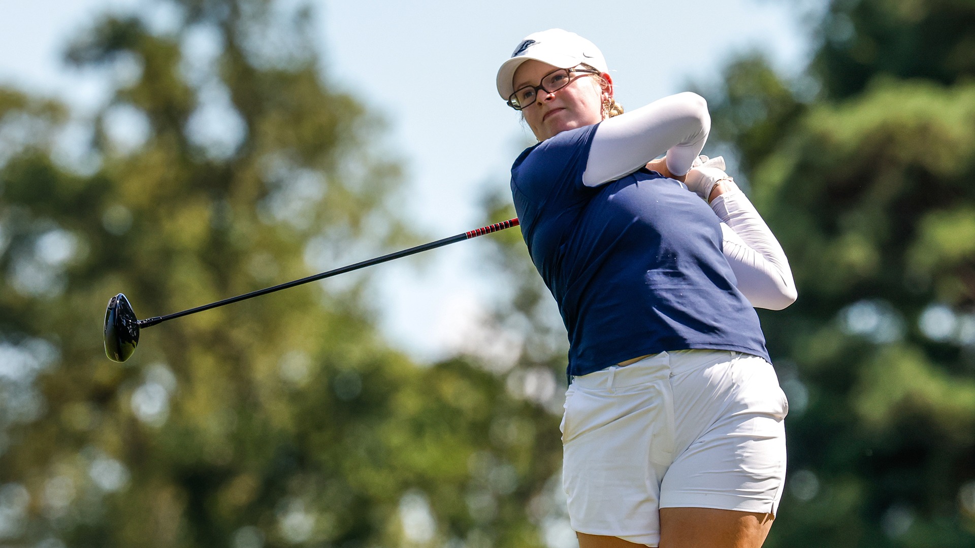 Romy Wagner follows through and watches her drive off the tee during a practice round at the Kingsmill River Course. 