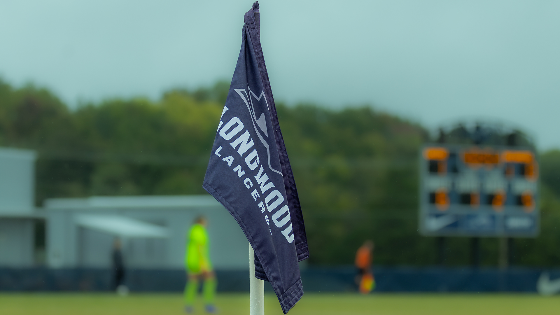 Photo of blue soccer corner flag with a Longwood logo