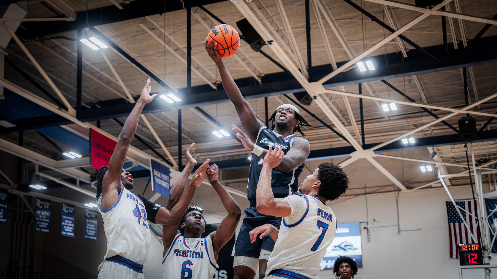 Elijah Tucker scores at the rim