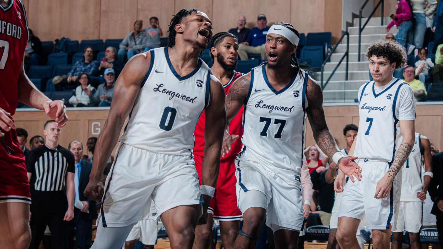 Johan Nziemi and Elijah Tucker celebrate a bucket