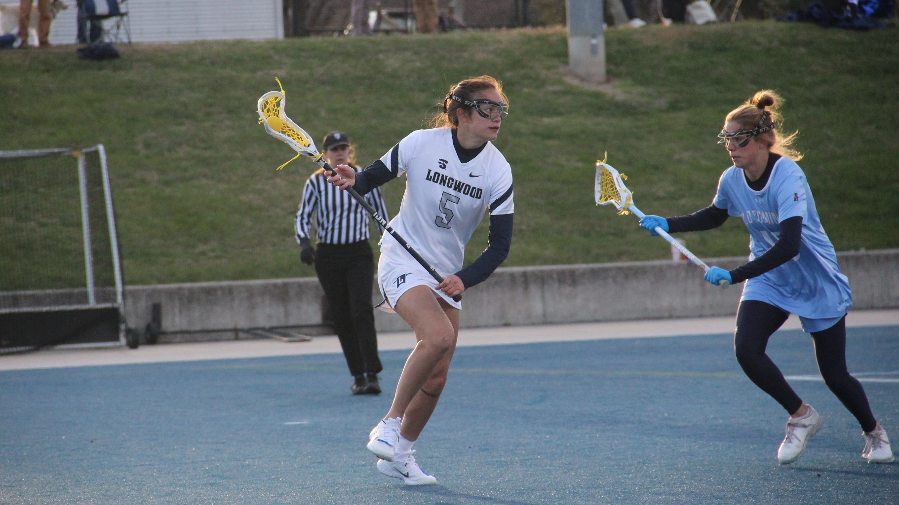 Kendra DeFilippo cradles the ball behind the goal