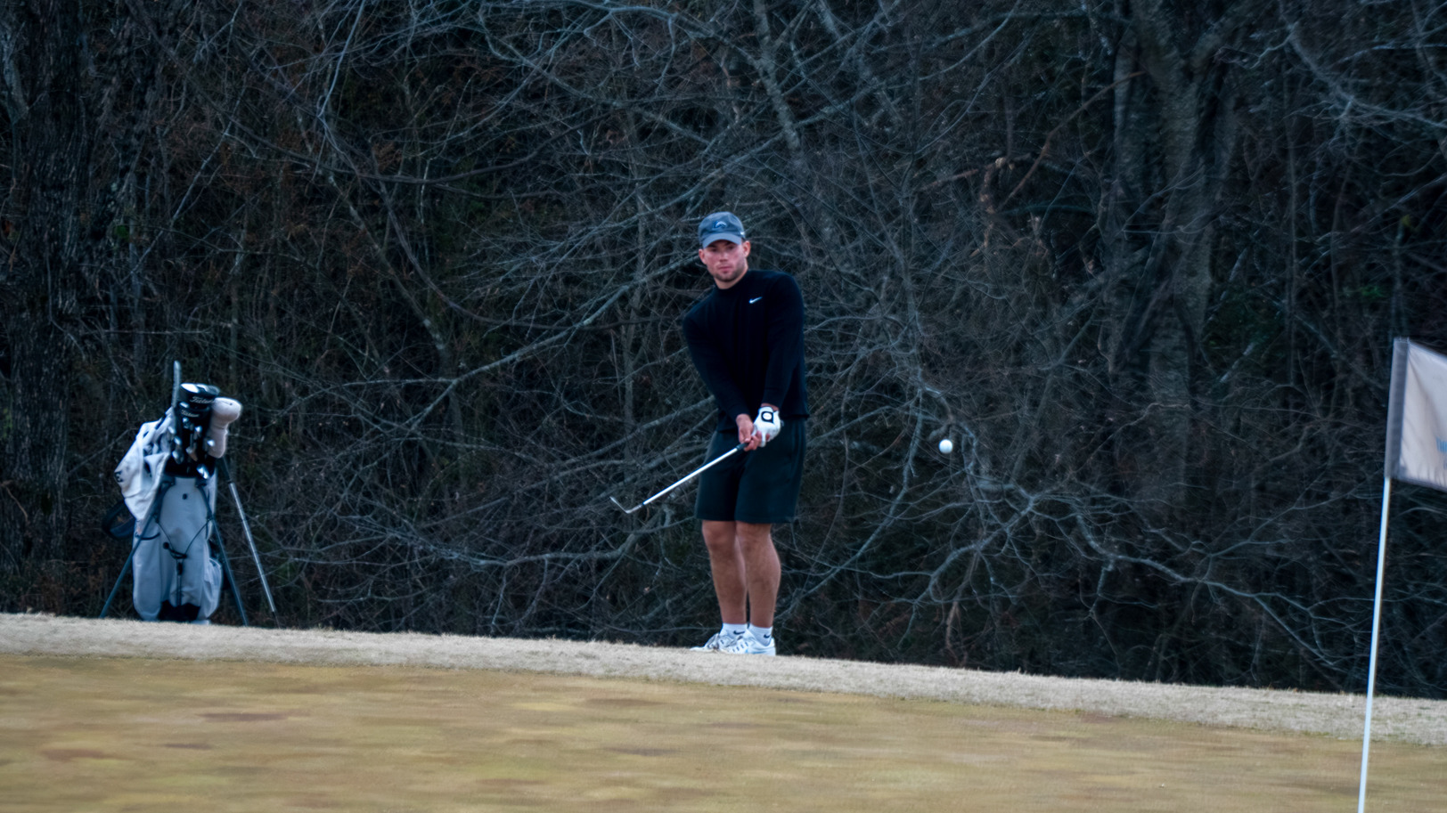 David Lafreniere chips to the green