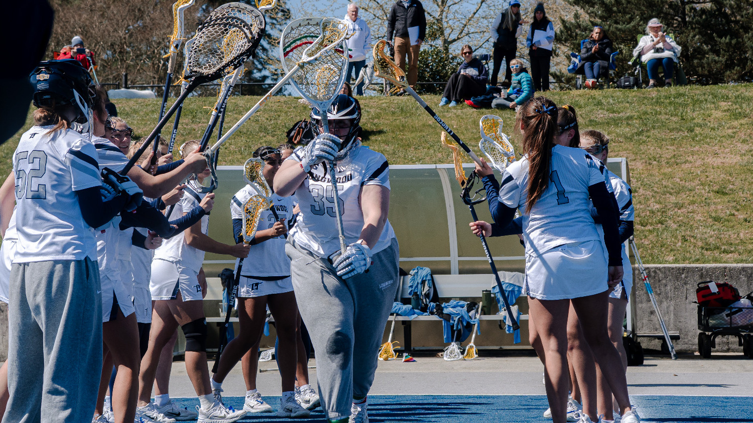 Isabella McCullough runs through the starting lineup