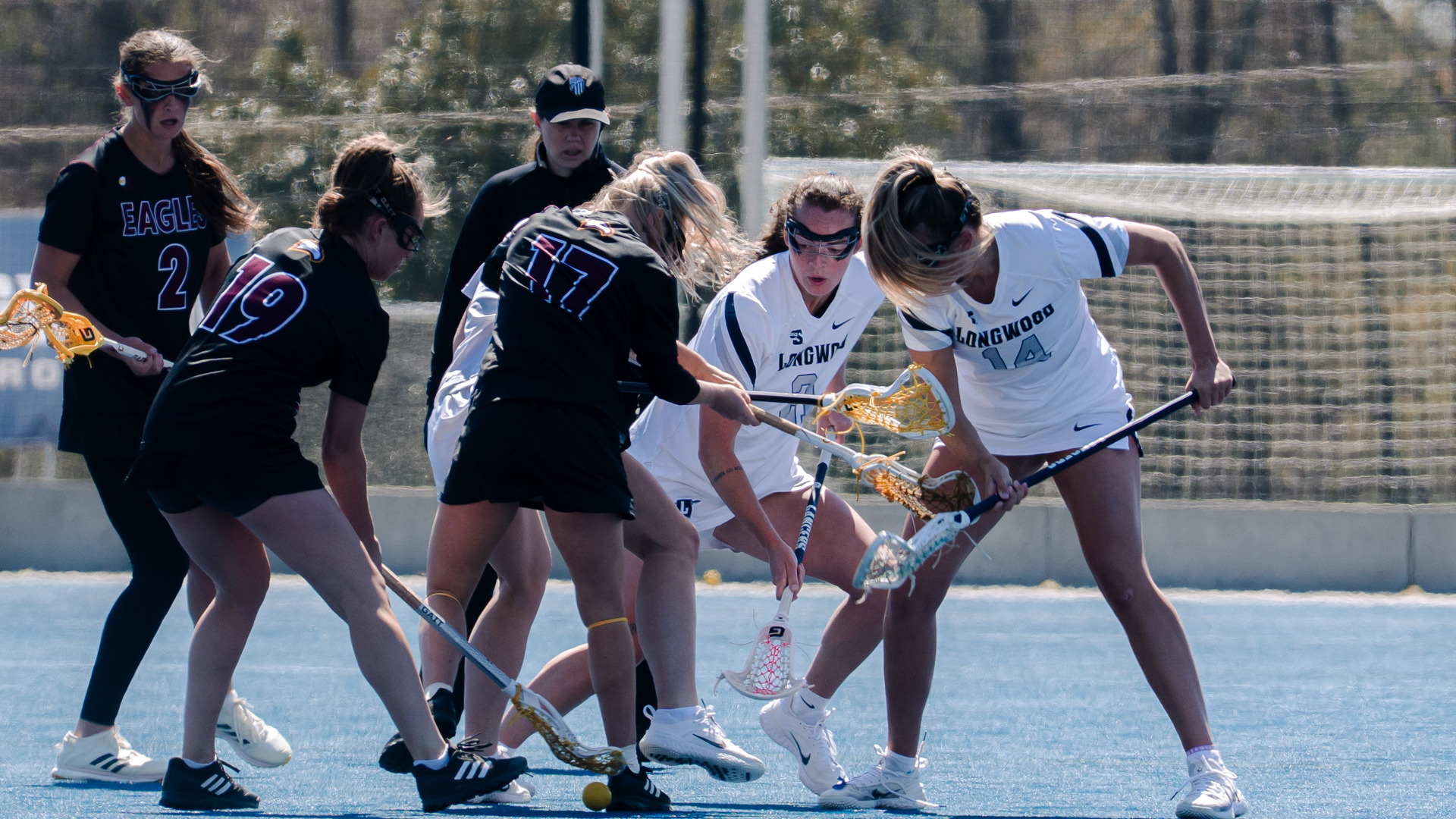 Madi Rogers, Lily Stohlman battle for the ball