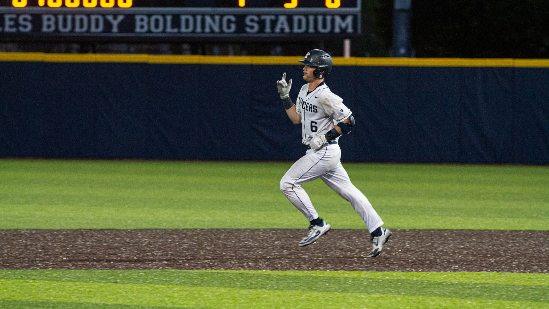Jack McMullan runs the bases
