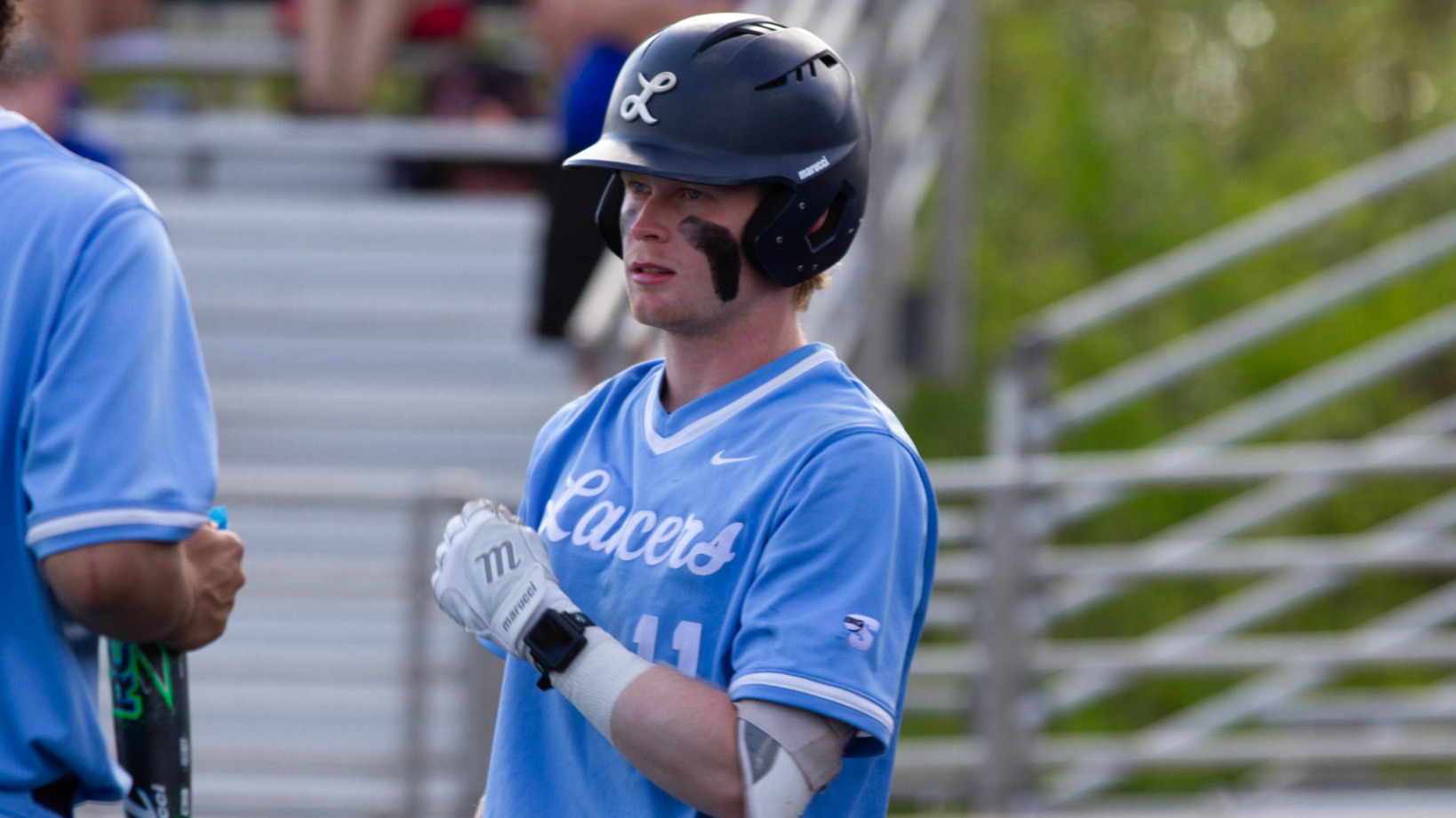 Max Lawson high fives a teammate