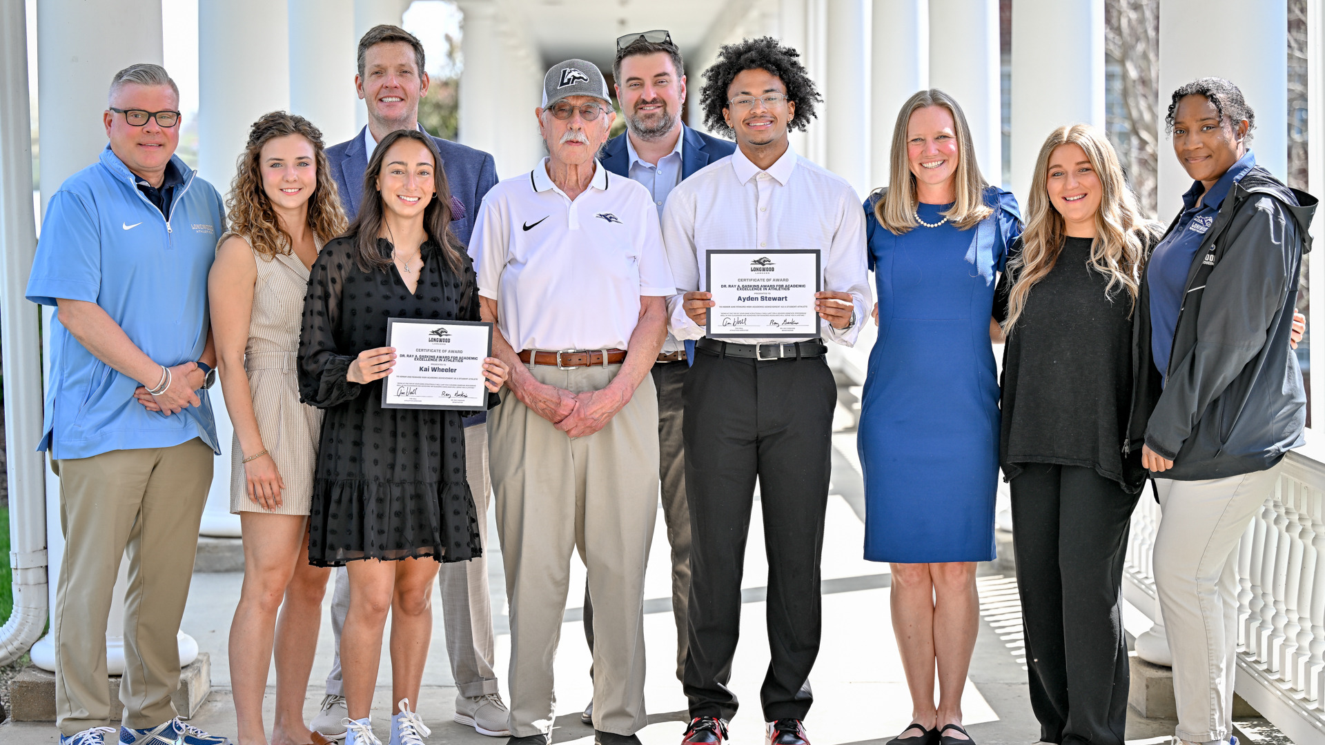 Ayden Stewart, Kai Wheeler are presented with the Dr. Ray Gaskins Academic Excellence In Athletics Award for their performance in both competition and in the classroom
