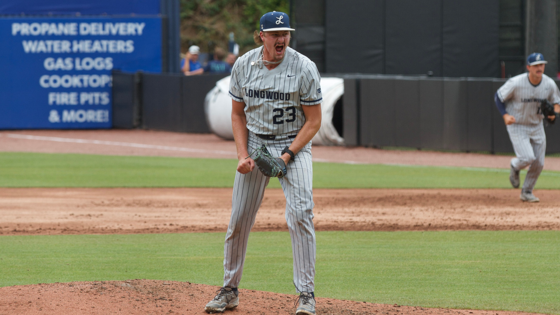 Jackson Nash storms off the mound after a strikeout