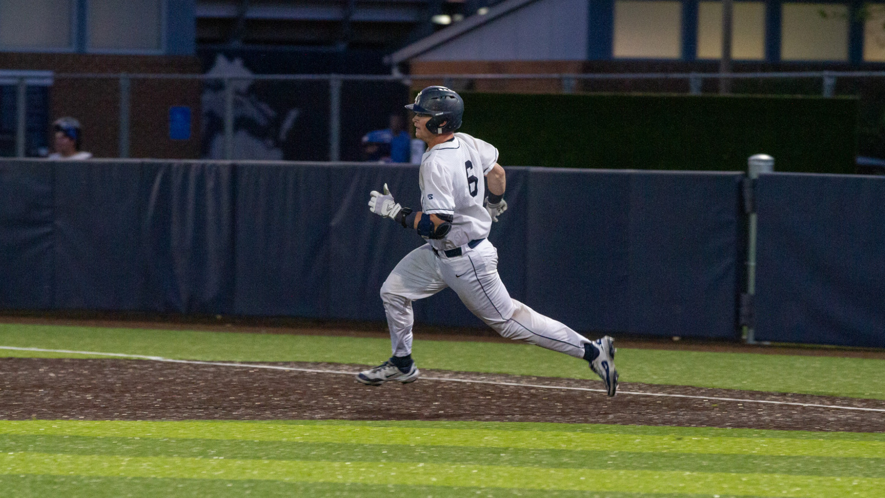 Jack McMullan runs the bases