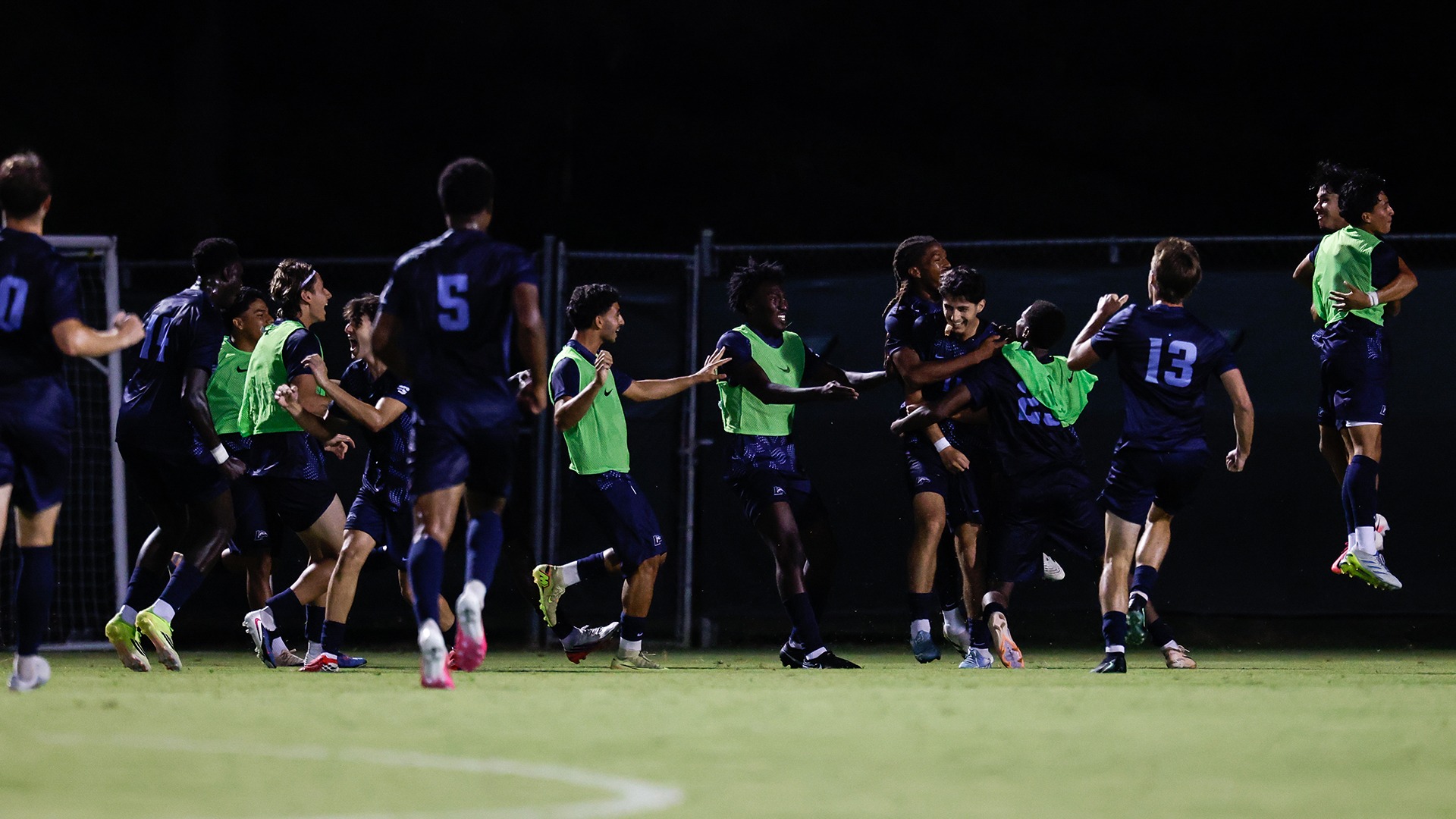 The Longwood bench celebrates with Youssef Shafei after his second goal of the night gave the Lancers at 6-4 lead with just 1:12 remaining at W&M. 