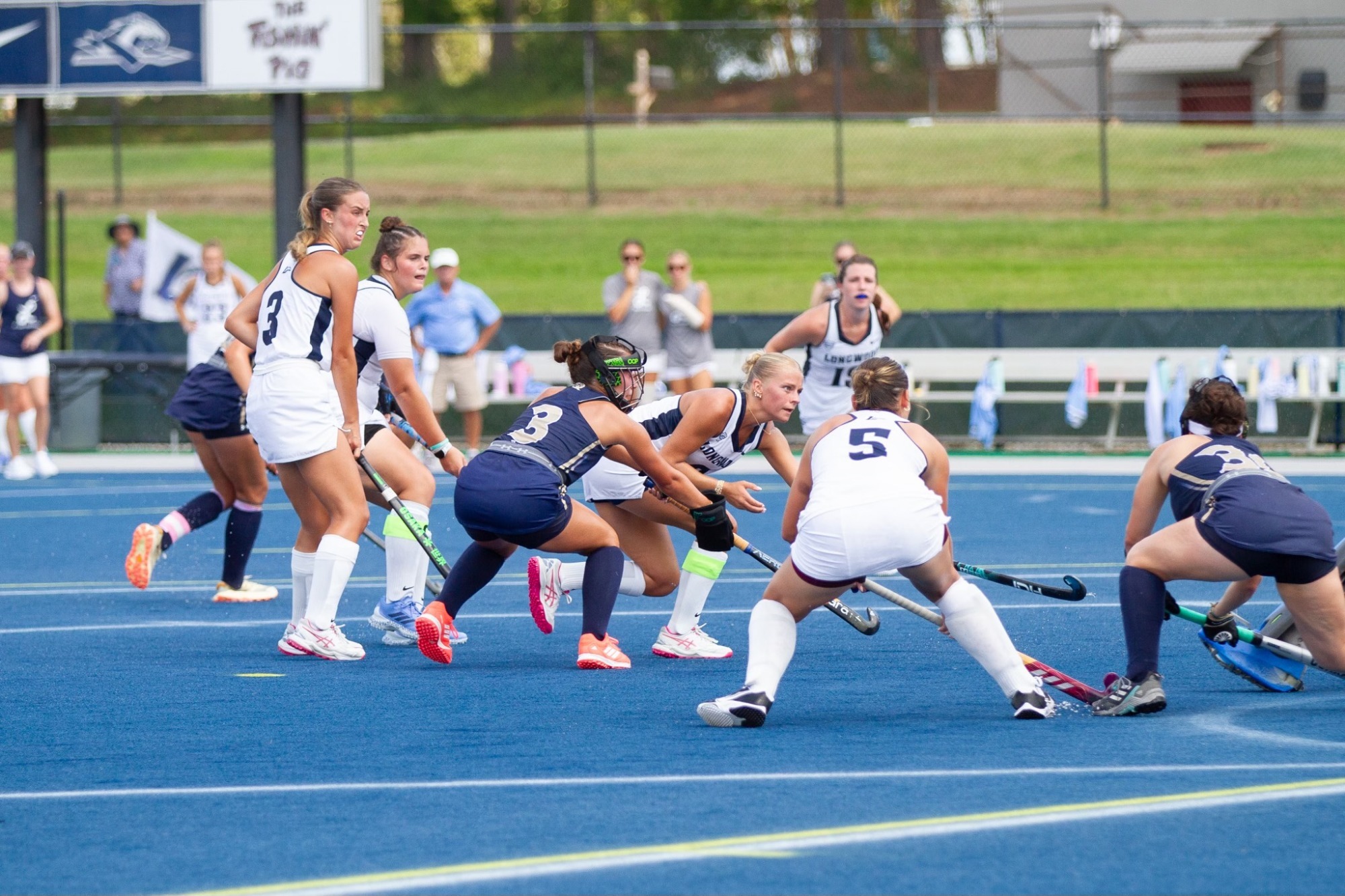 Channy Johnson pokes the ball into the net in a 3-1 loss to Queens