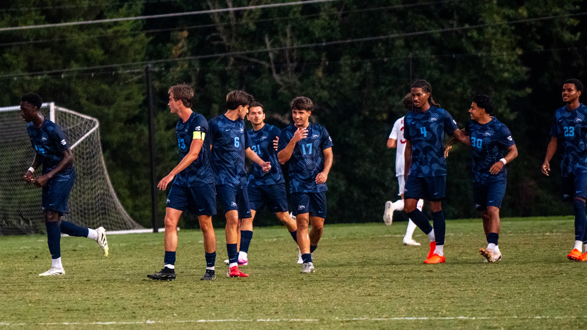 The Lancers celebrate one of their five goals and run back to the midfield line during the home win over Southern Virginia on Aug. 28. 