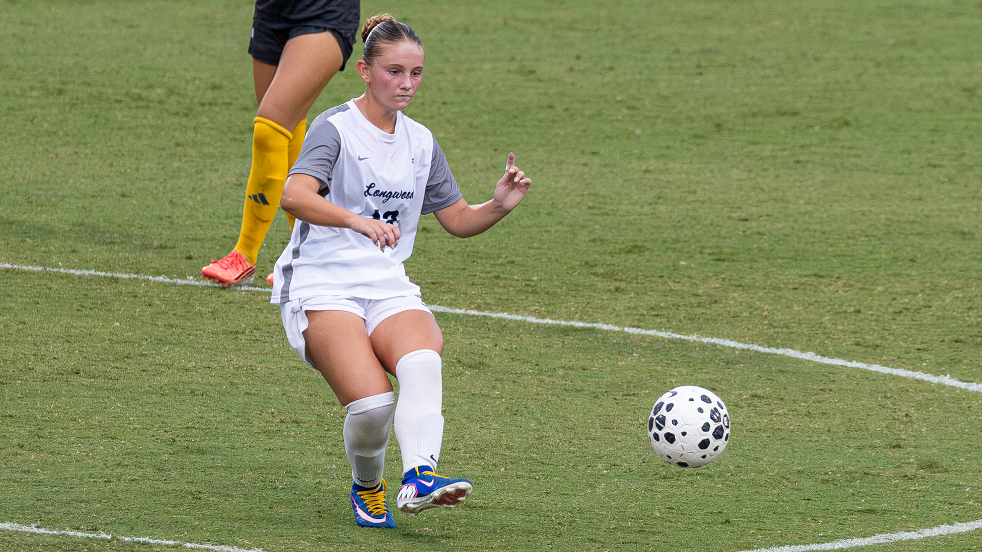 Coryn Silberstein plays a ball in a match against George Mason at home on September 10, 2026