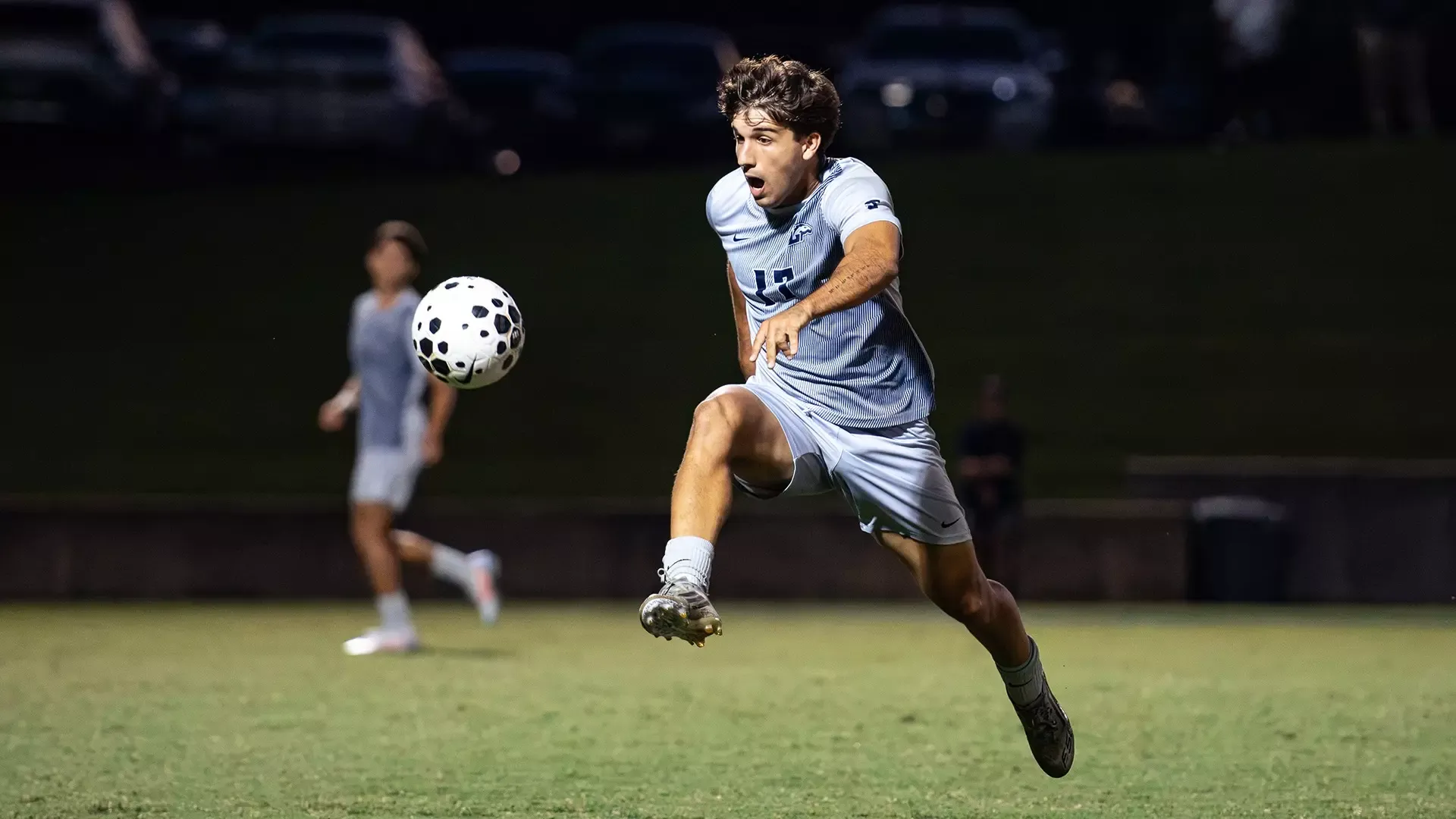 Vicent Martinez jumps to volley a ball to gain possession in the second half of the Lancers' 2-0 setback to Navy on Sept. 15, 2026. 