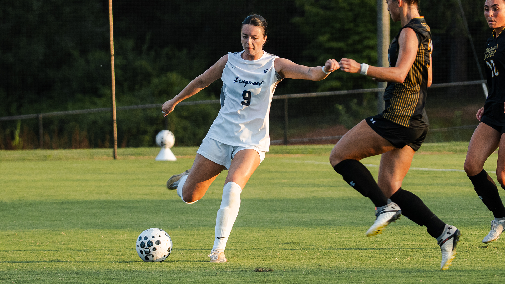 Maddy Howells strikes the ball in exhibition action against William & Mary on Aug. 8 at the Longwood Athletics Complex