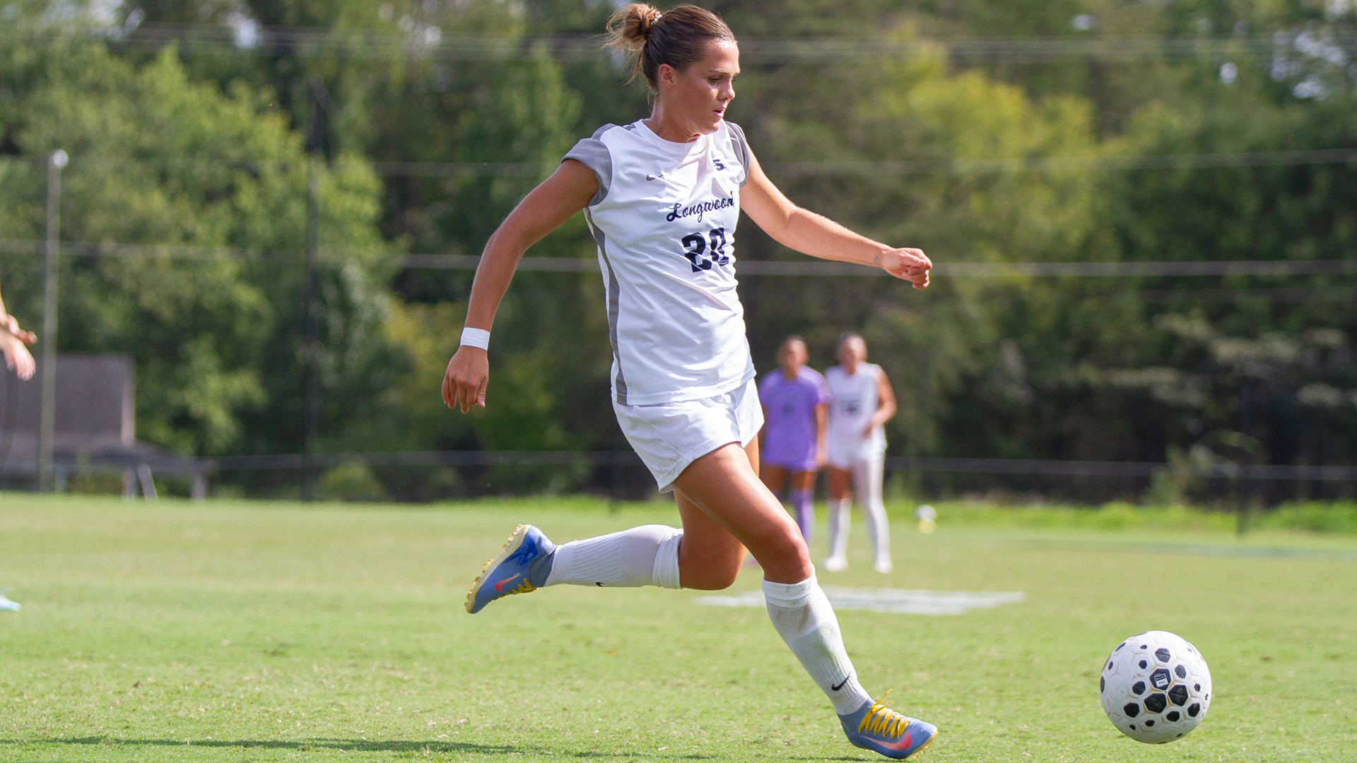 McKenna Vogel dribbles the ball in a game against High Point at home on September 19, 2026